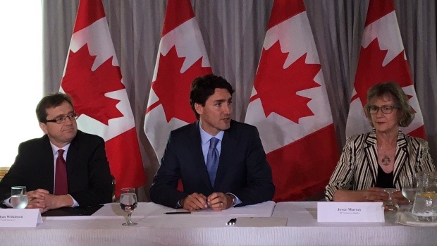 primejustin-trudeau-addresses-a-room-full-of-academics-politicians-and-stakeholders-in-a