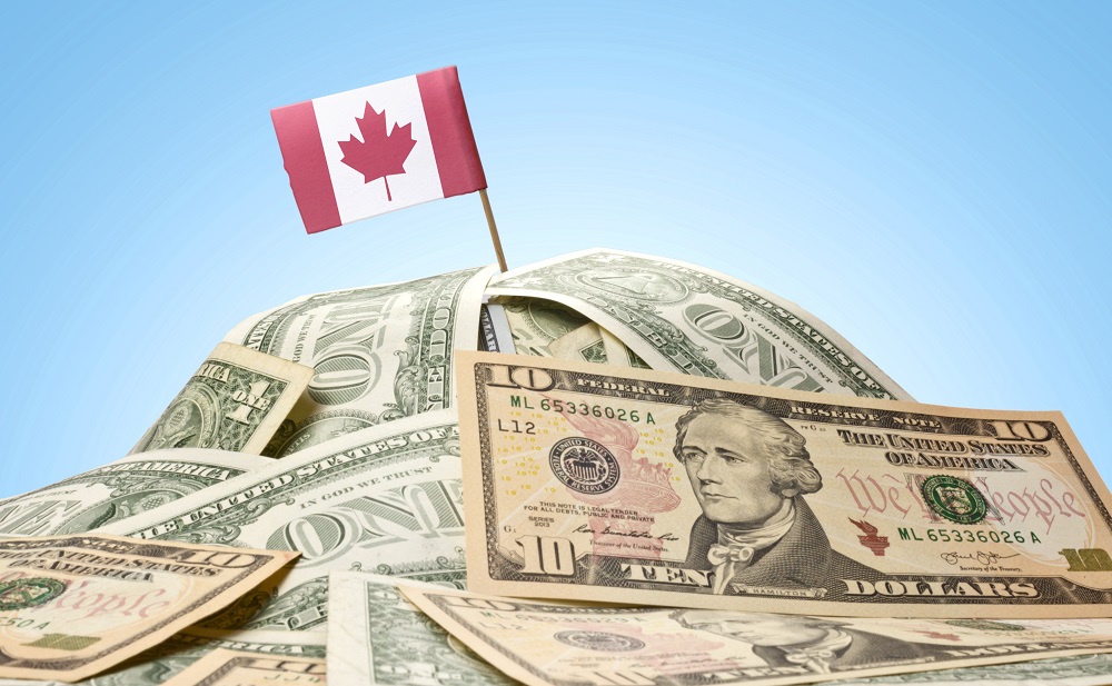 پیش بینی افزایش 11 سنتی ارزش دلار کانادا مقابل دلار آمریکا در سال 2022